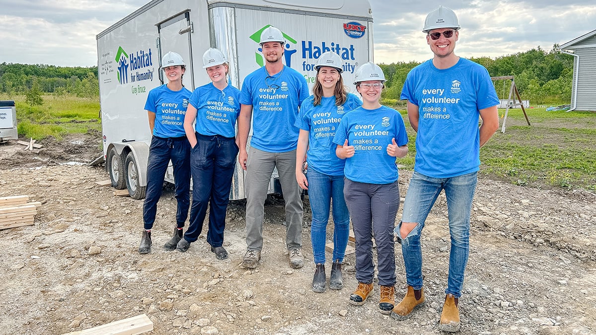 Bruce Power Habitat for Humanity volunteers in hardhats. 