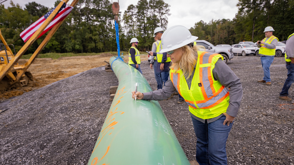A person signing the pipeline
